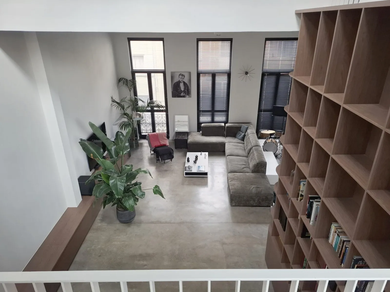 The living room and atrium seen from the mezzanine